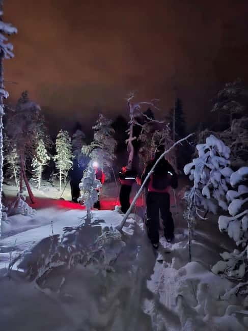 Luosto: Private Sliding Ski Adventure with Local Guide - Moving through the snowy forest