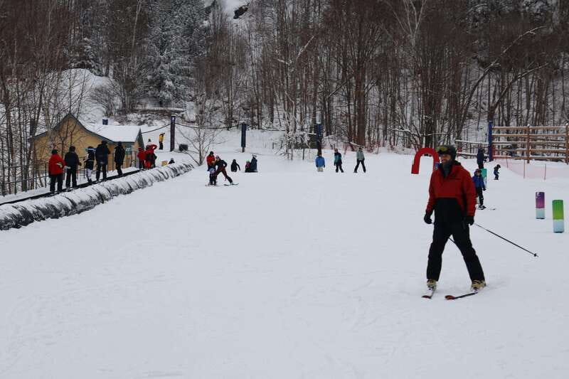 Montreal: Guided Skiing in Quebec Forests - Getting fitted with skis, clothing, and a helmet