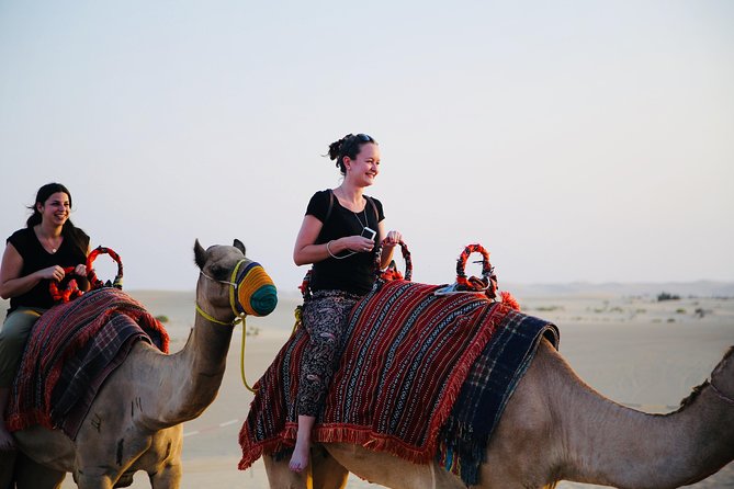 Morning Desert Safari with Camel Ride & Sand Skiing Private Tours - Dune Bashing in a 4x4 Land Cruiser