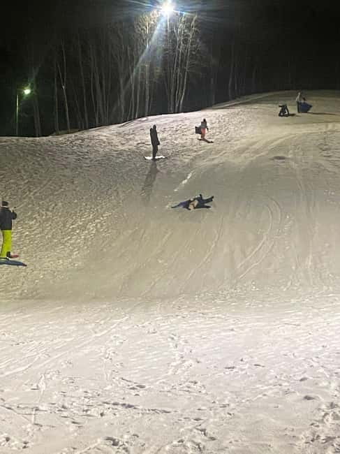 Tromsø: Sledding, Toboggan, Mini Skiing, Lasso & Arctic Fun - Sami lasso throwing with real antlers