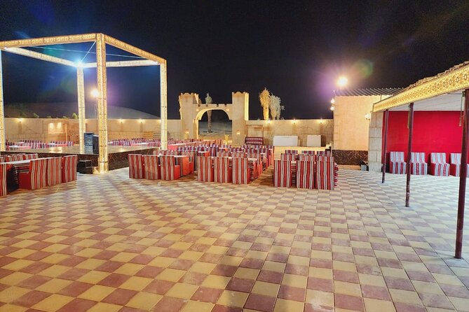 VIP Dubai Desert Safari Camel Ride, Sand Ski, Live BBQ Dinner - Camel riding and a first taste of camp life